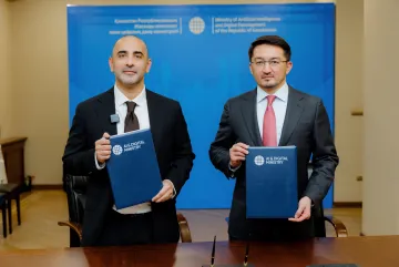 Representatives hold the signed memorandum of understanding