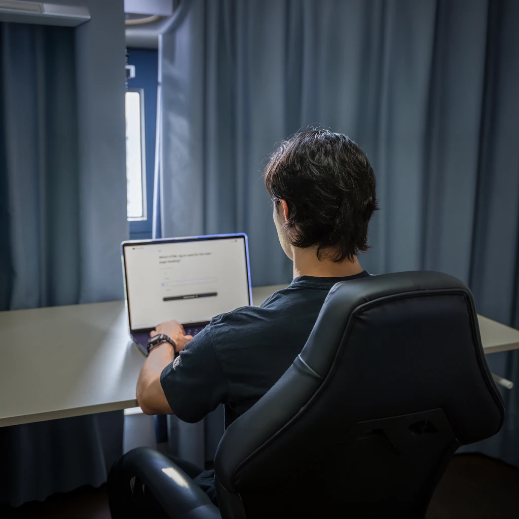 A student taking the Network School exam online